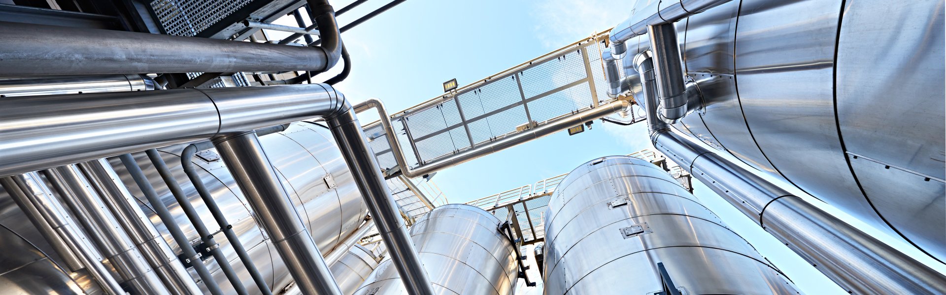 Low angle shot of storage tanks