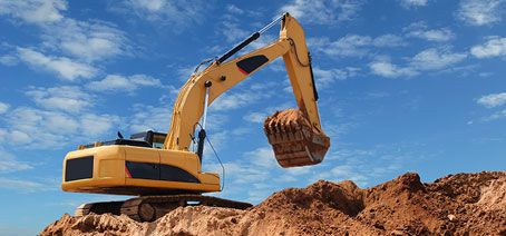 Excavator-in-sand_454x212px